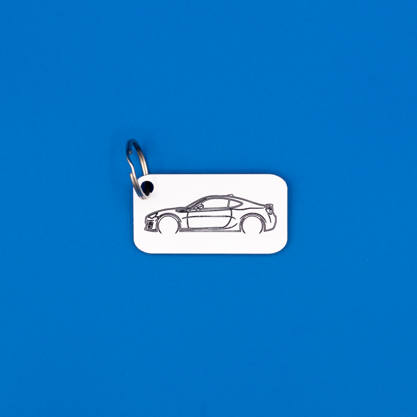 Toyota GT86 Acrylic Keychain in white with classic key ring.
