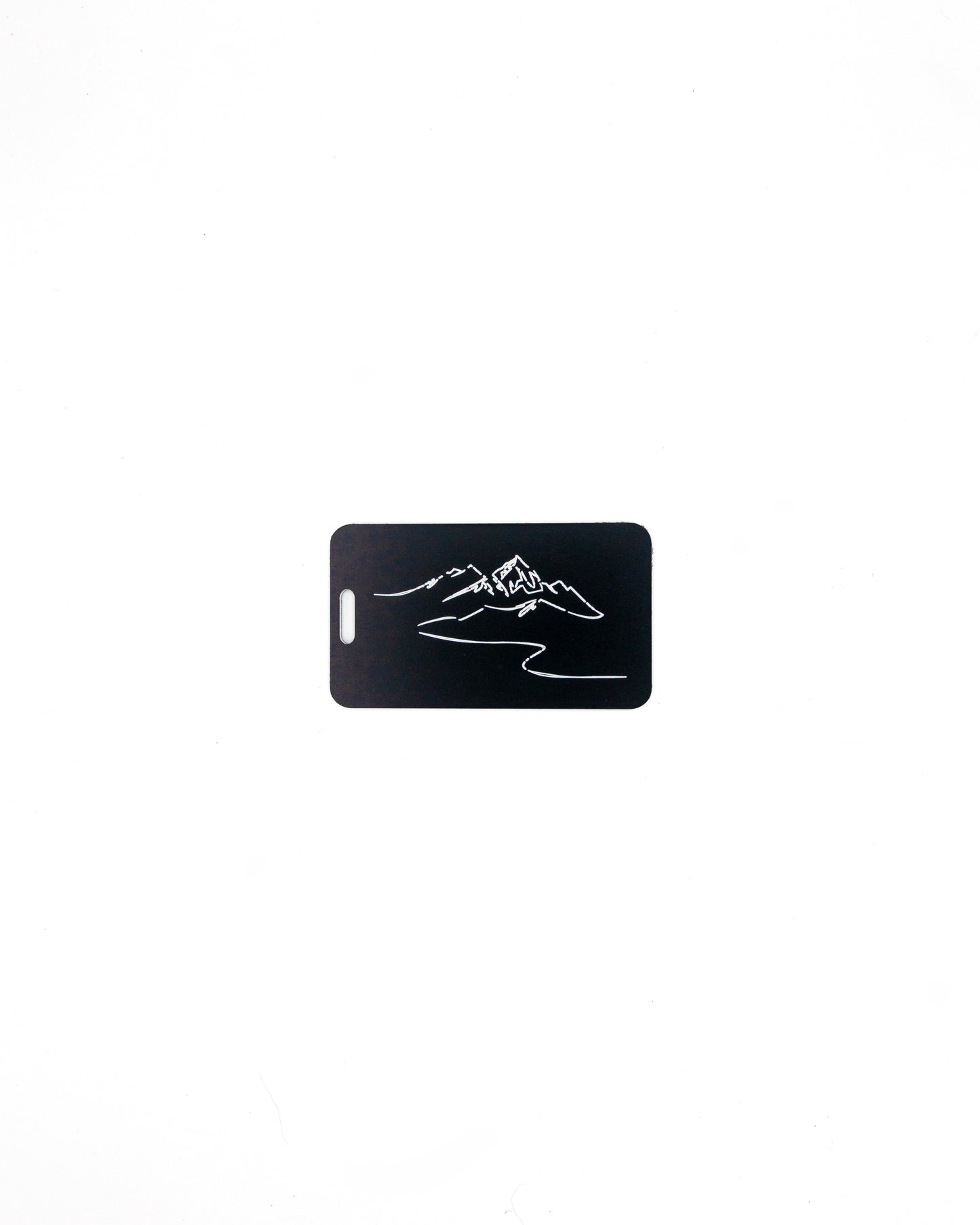 Mountain Design acrylic luggage tag in black.