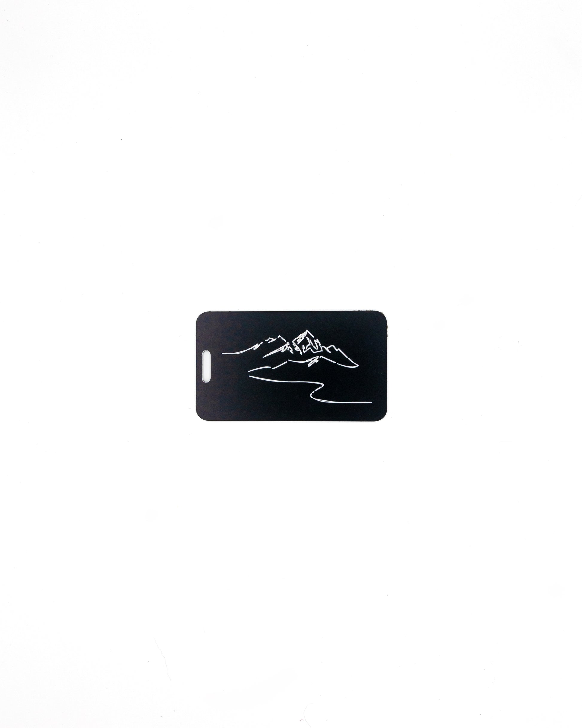Mountain Design acrylic luggage tag in black.