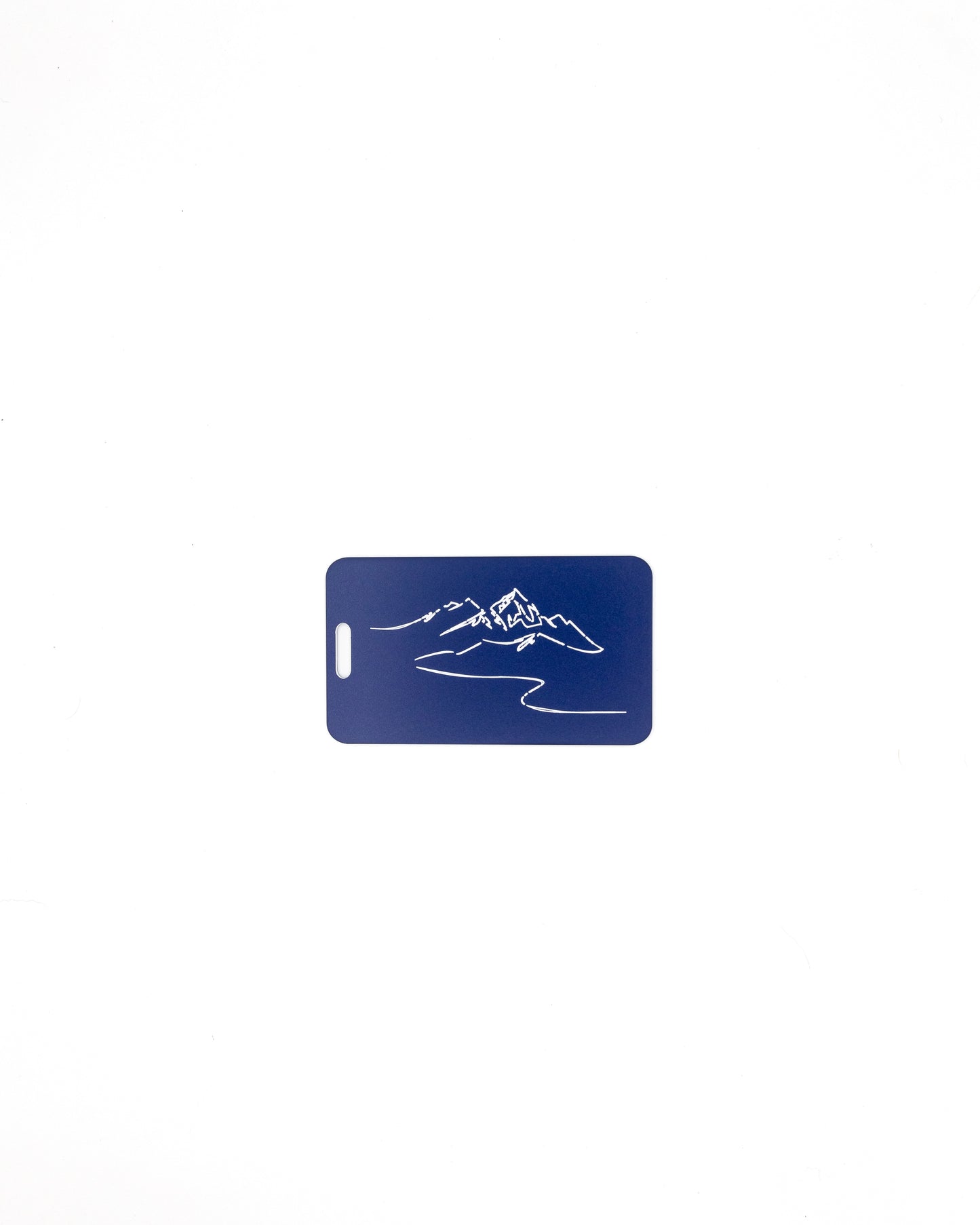Mountain Design acrylic luggage tag in dark blue.