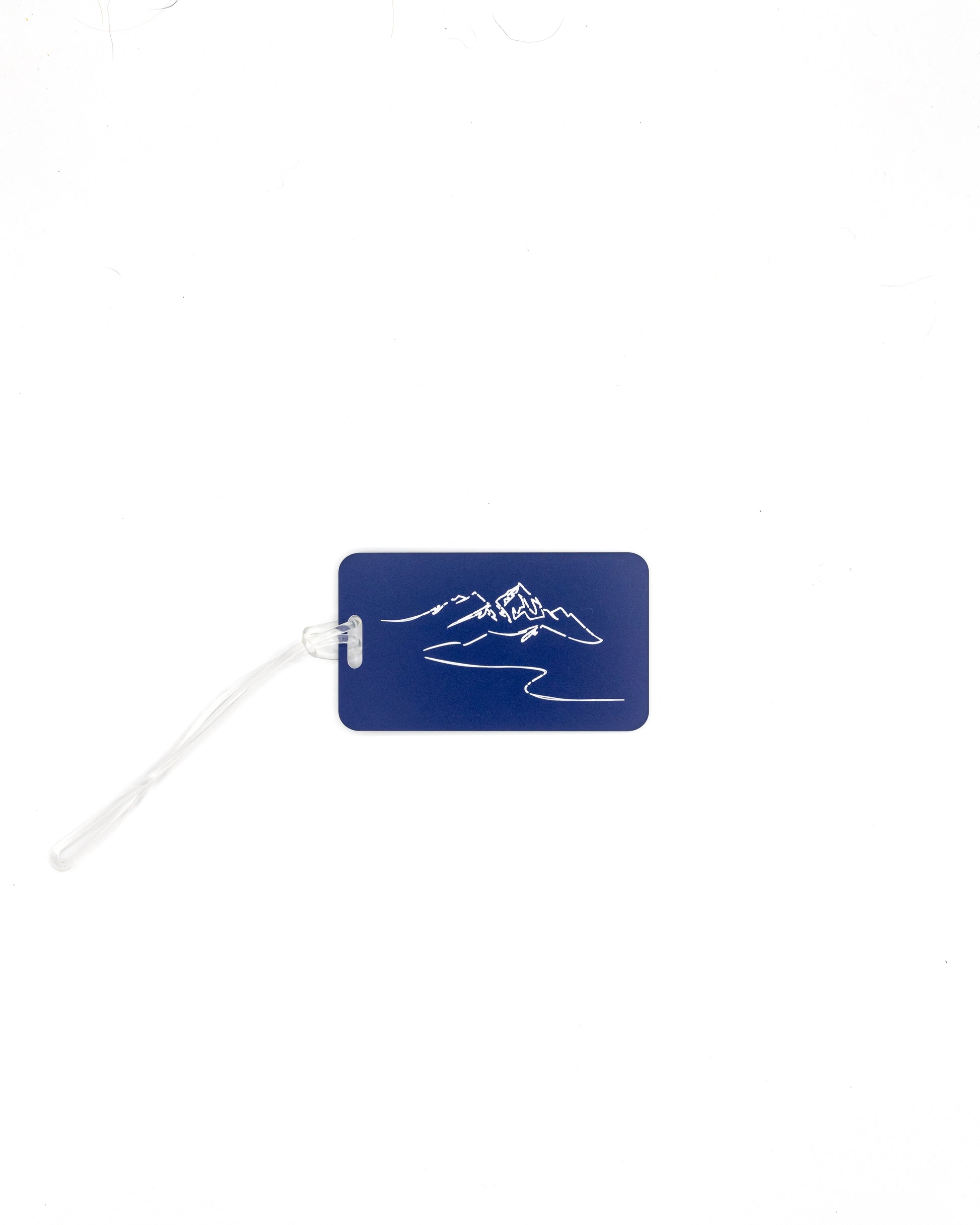 Mountain Design acrylic luggage tag in dark blue with worm loop.