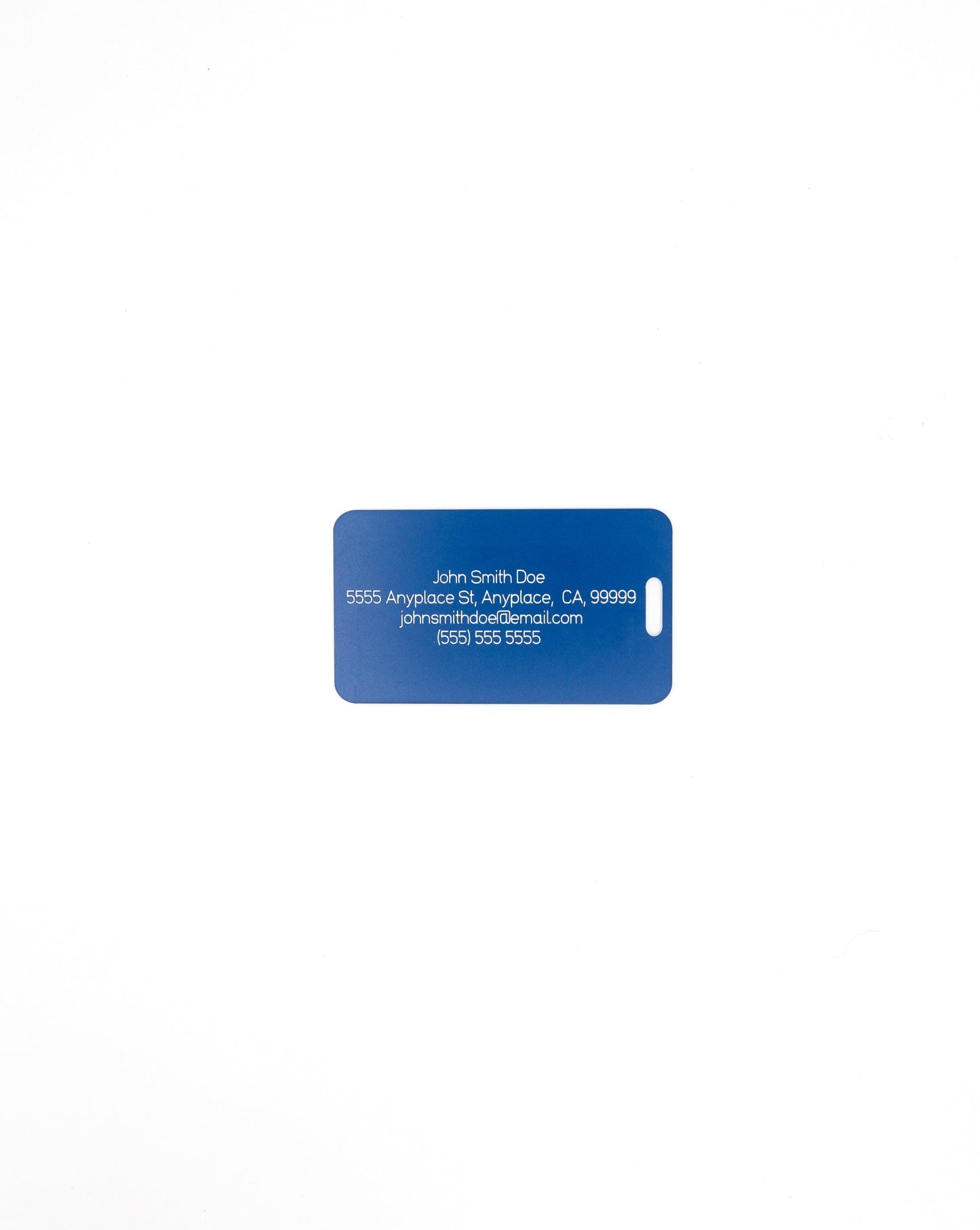 Rear of luggage design acrylic luggage tag with travel information in light blue.