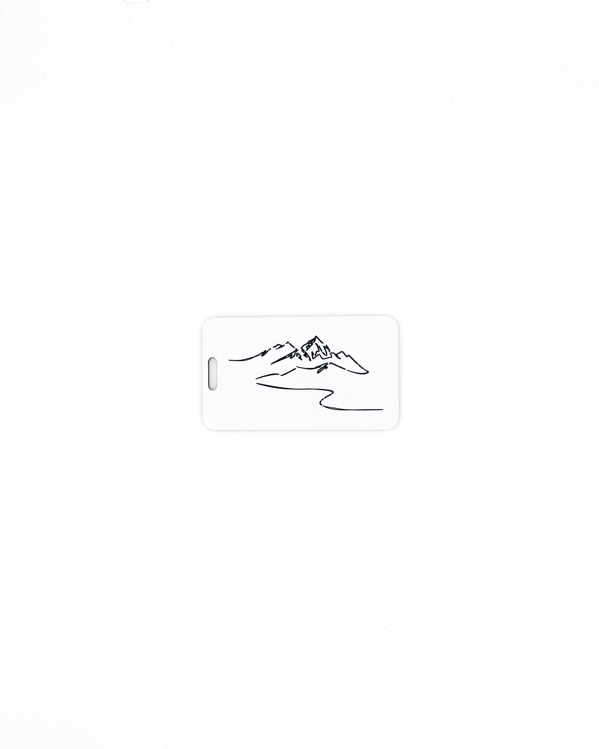 Mountain Design acrylic luggage tag in white.