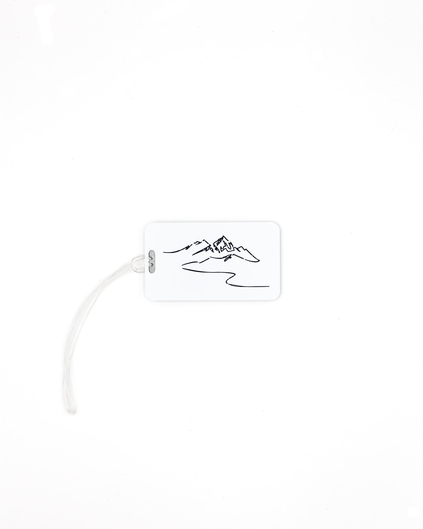 Mountain Design acrylic luggage tag in white with worm loop.