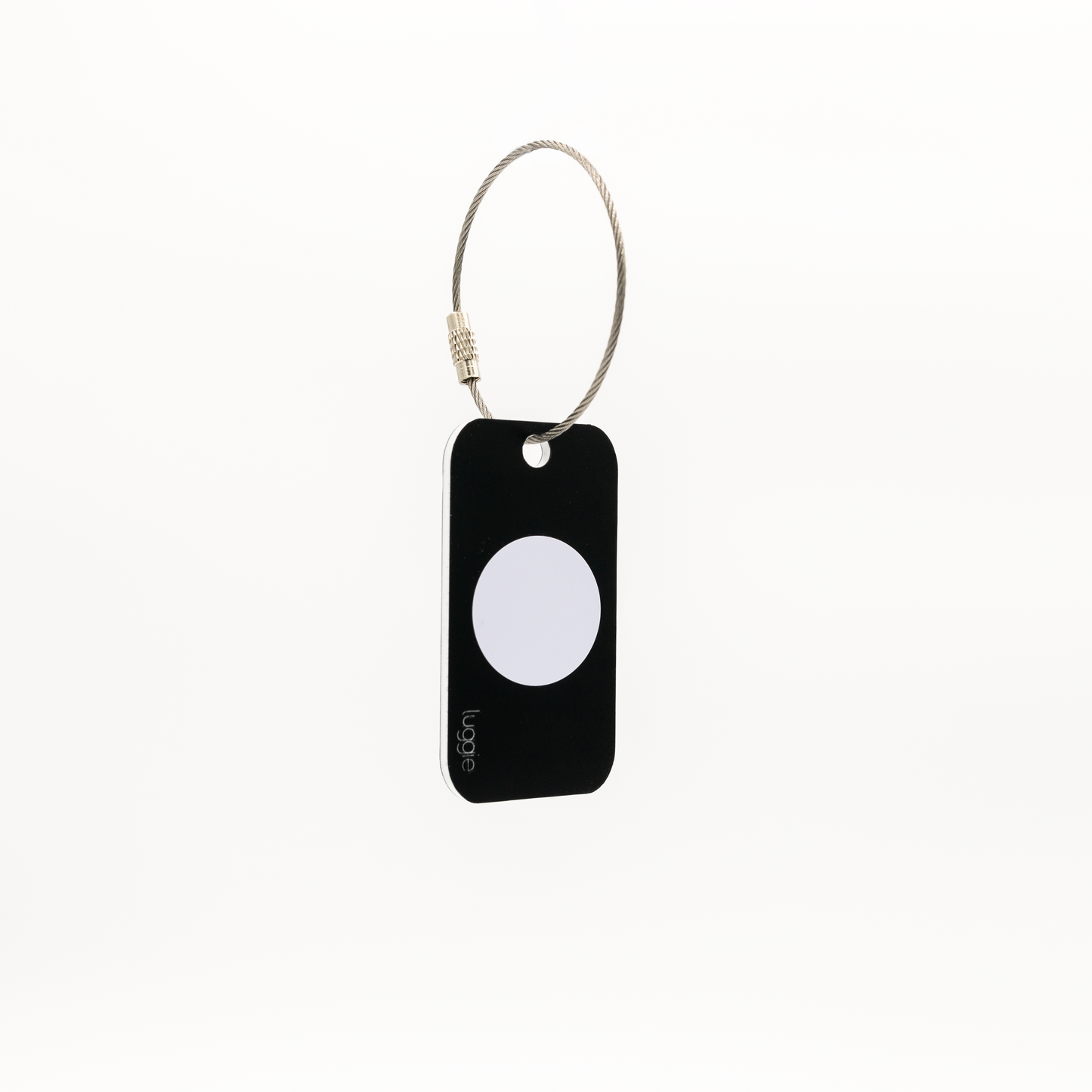 Back view of the black Luggie Keychain with a white NFC chip embedded, designed for smart connectivity and daily use.