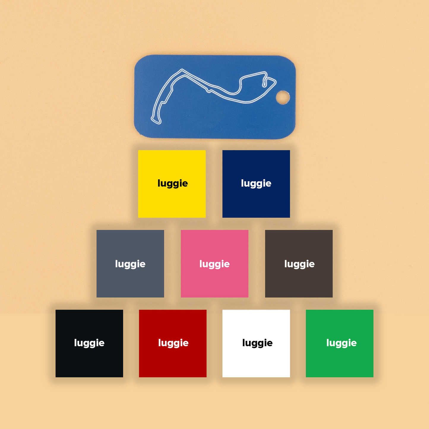 Monaco Grand Prix Acrylic Keychain in light blue with just the hole showcasing nine color options: yellow, dark blue, grey, pink, chocolate, white, red, black and spring green.