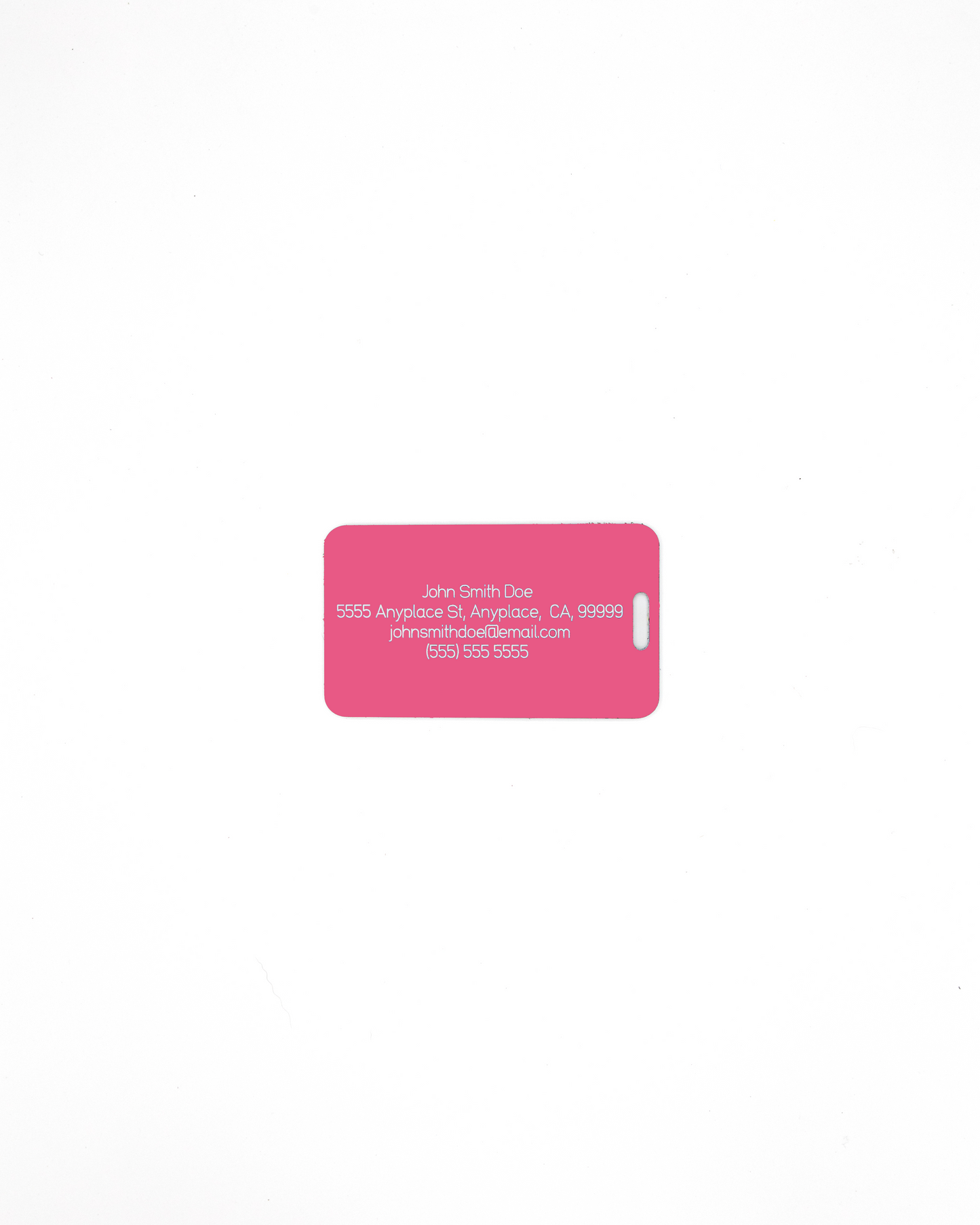 Acrylic luggage tag with information on rear in pink.