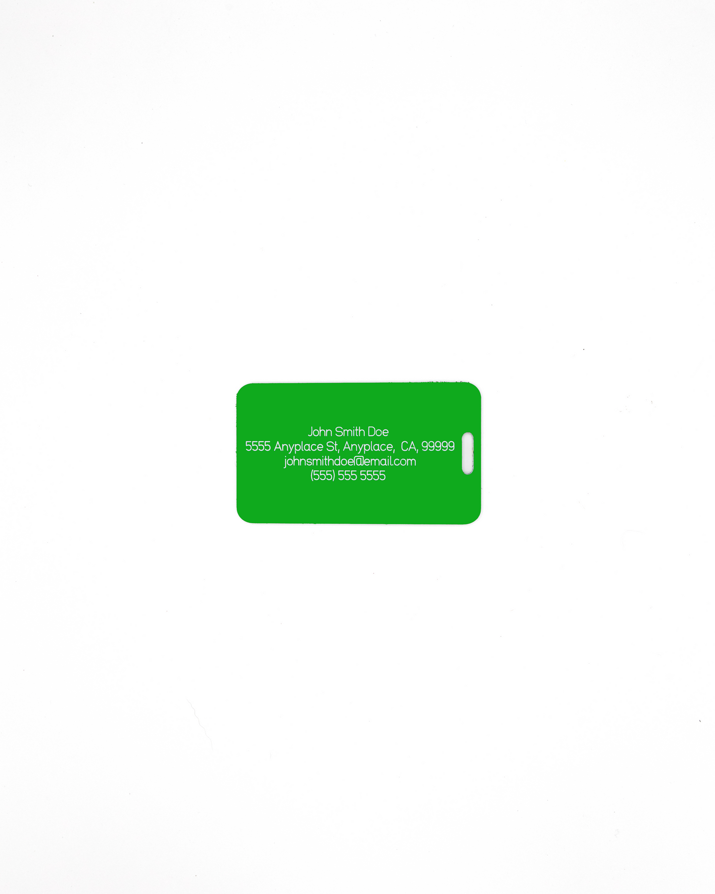 Acrylic luggage tag in spring green with information on rear.