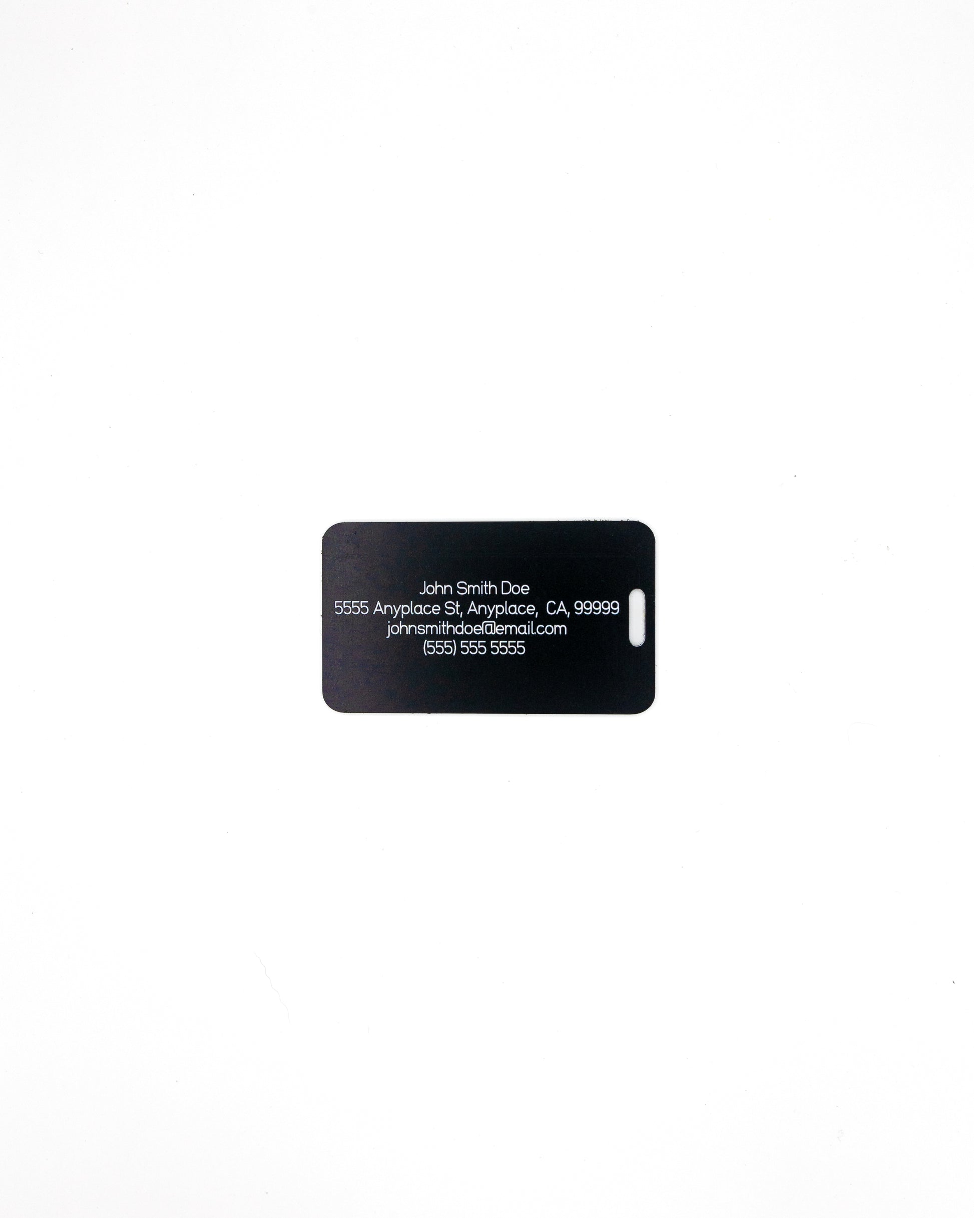 Rear of globe design acrylic luggage tag with travel information in black
