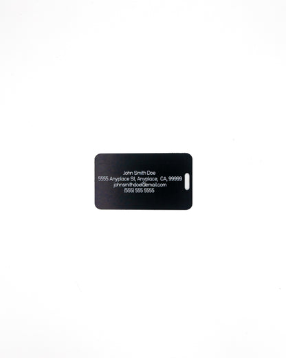 Rear of globe design acrylic luggage tag with travel information in black