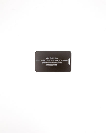 Rear of globe design acrylic luggage tag with travel information in chocolate