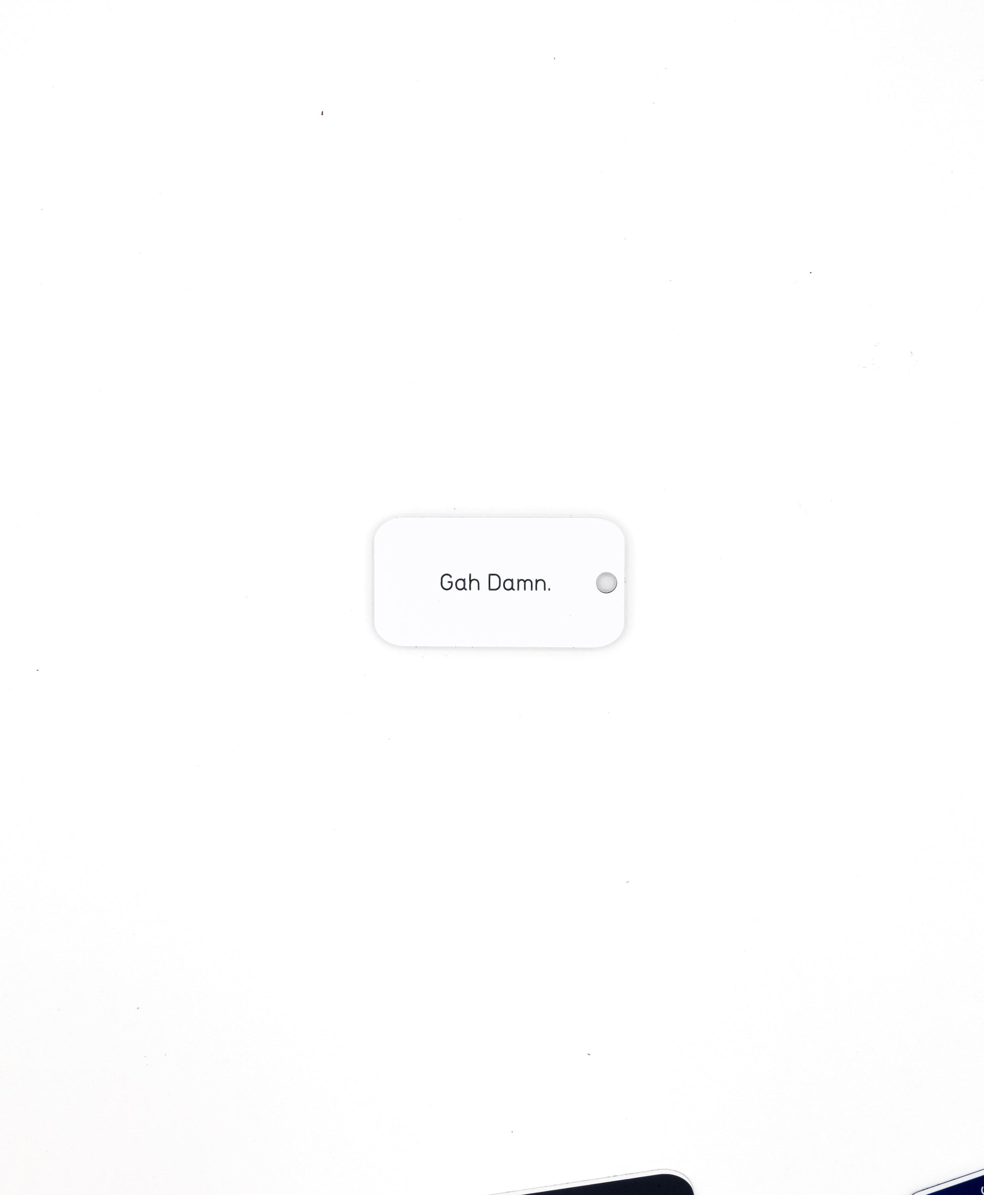white custom key tag with text