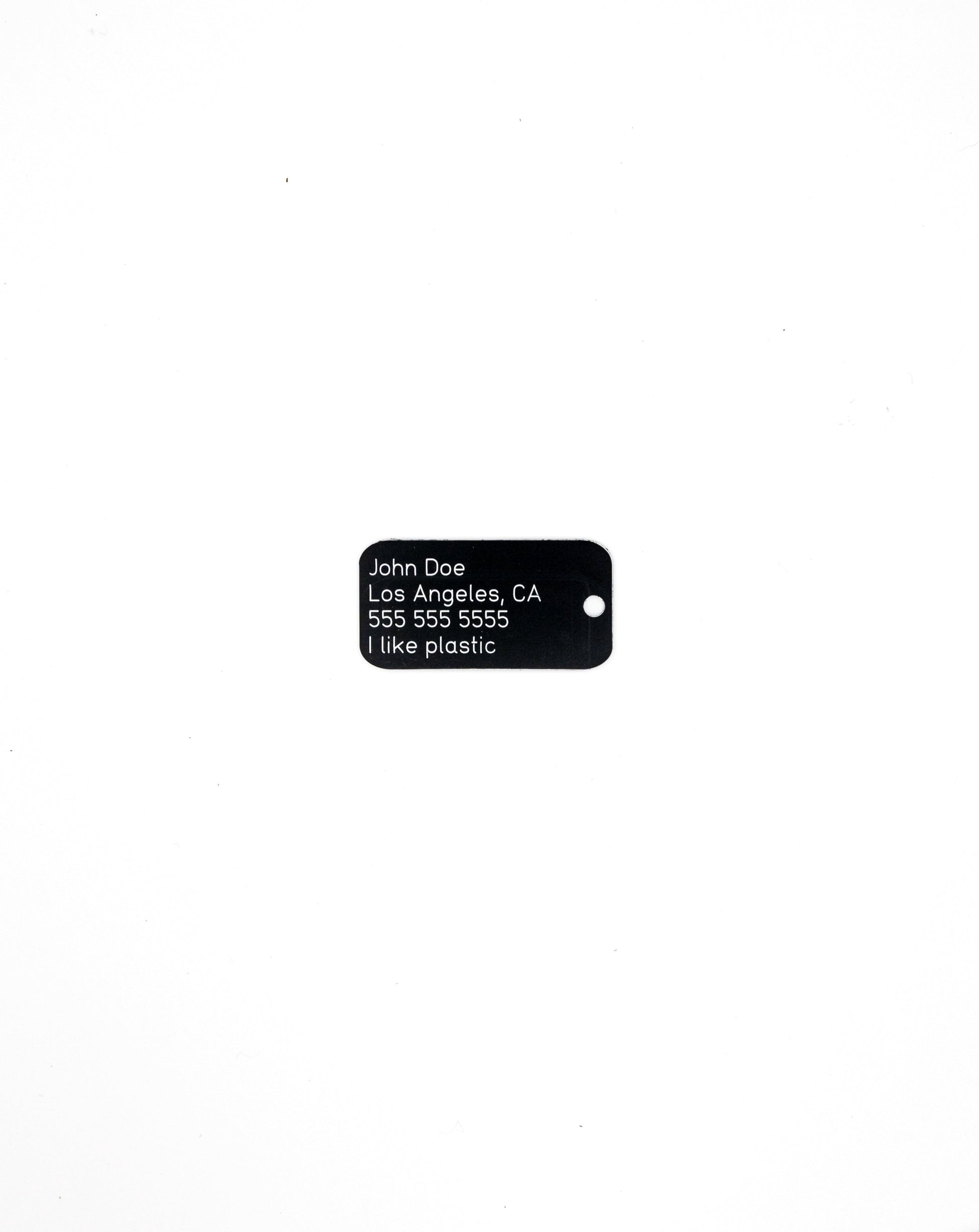 black custom key tag with text