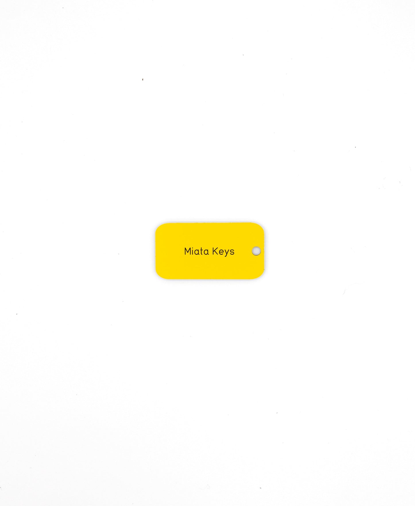 yellow custom key tag with text