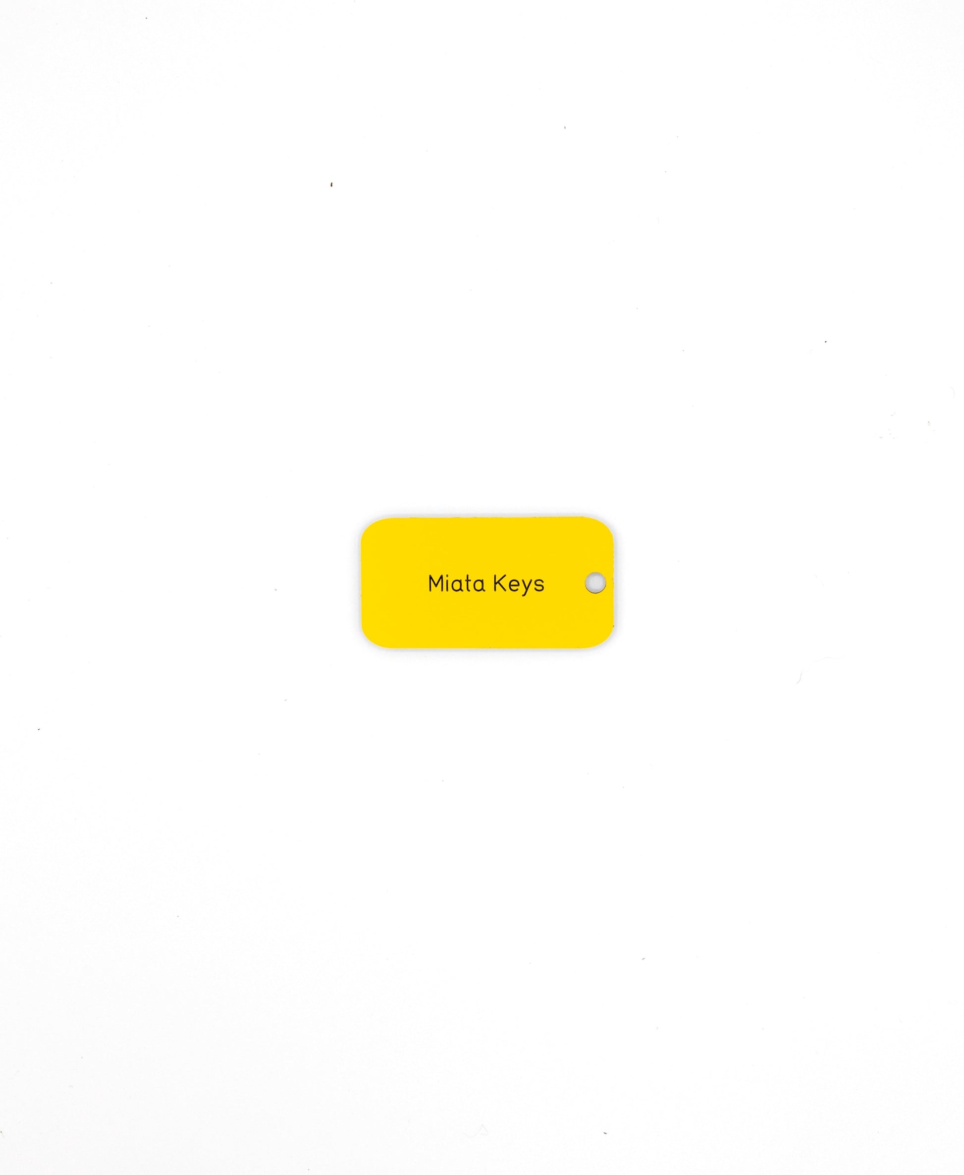 yellow custom key tag with text
