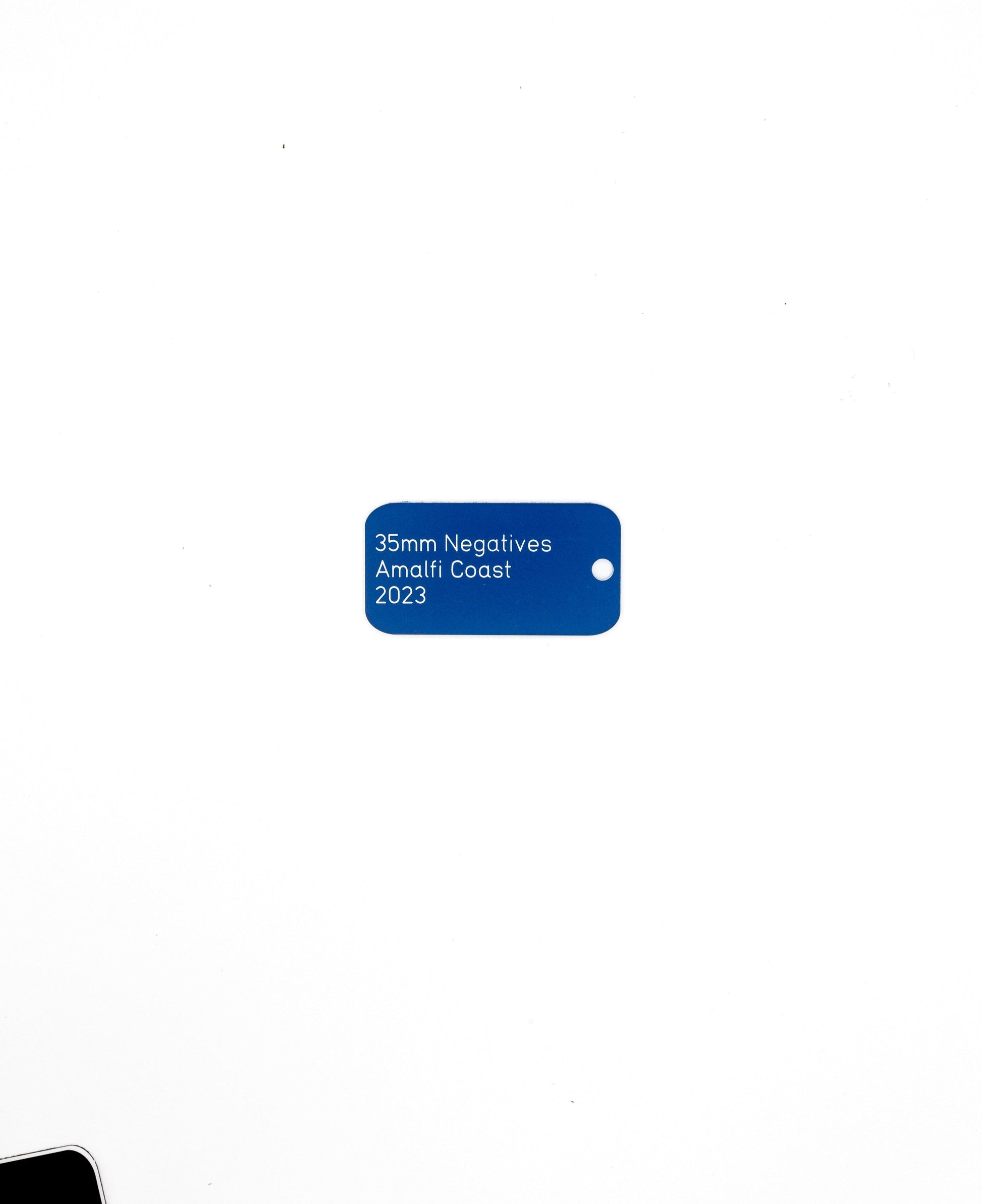 dark blue custom key tag with text