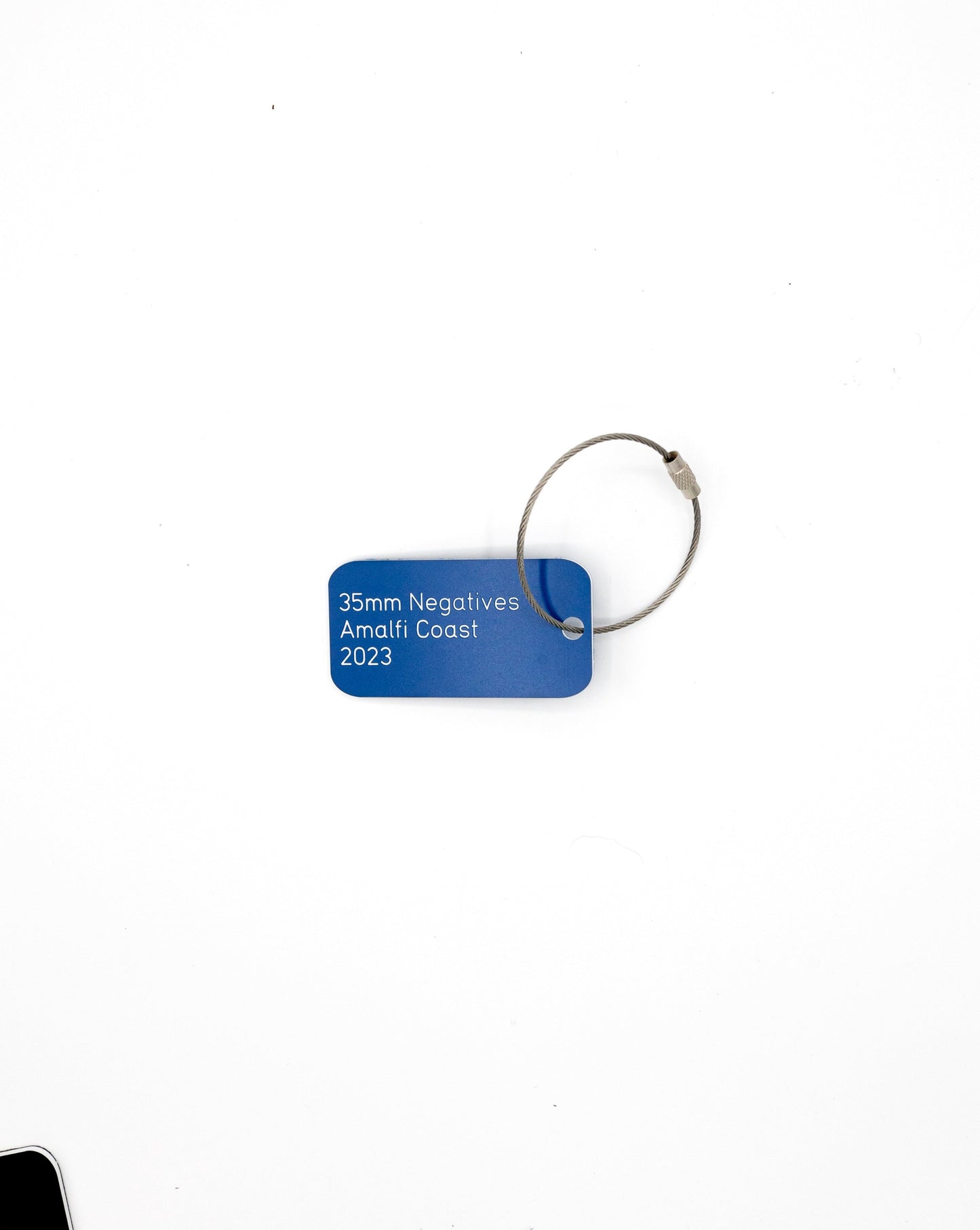 light blue custom key tag with text