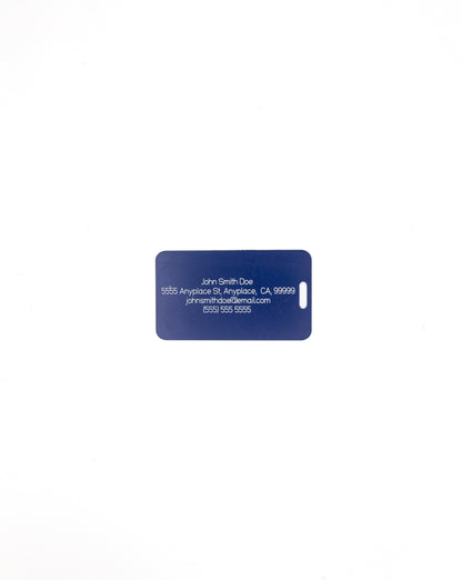 Rear of Beach Chair Design acrylic luggage tag in dark blue