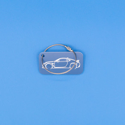 Toyota GR86 Keychain with wire loop on blue background