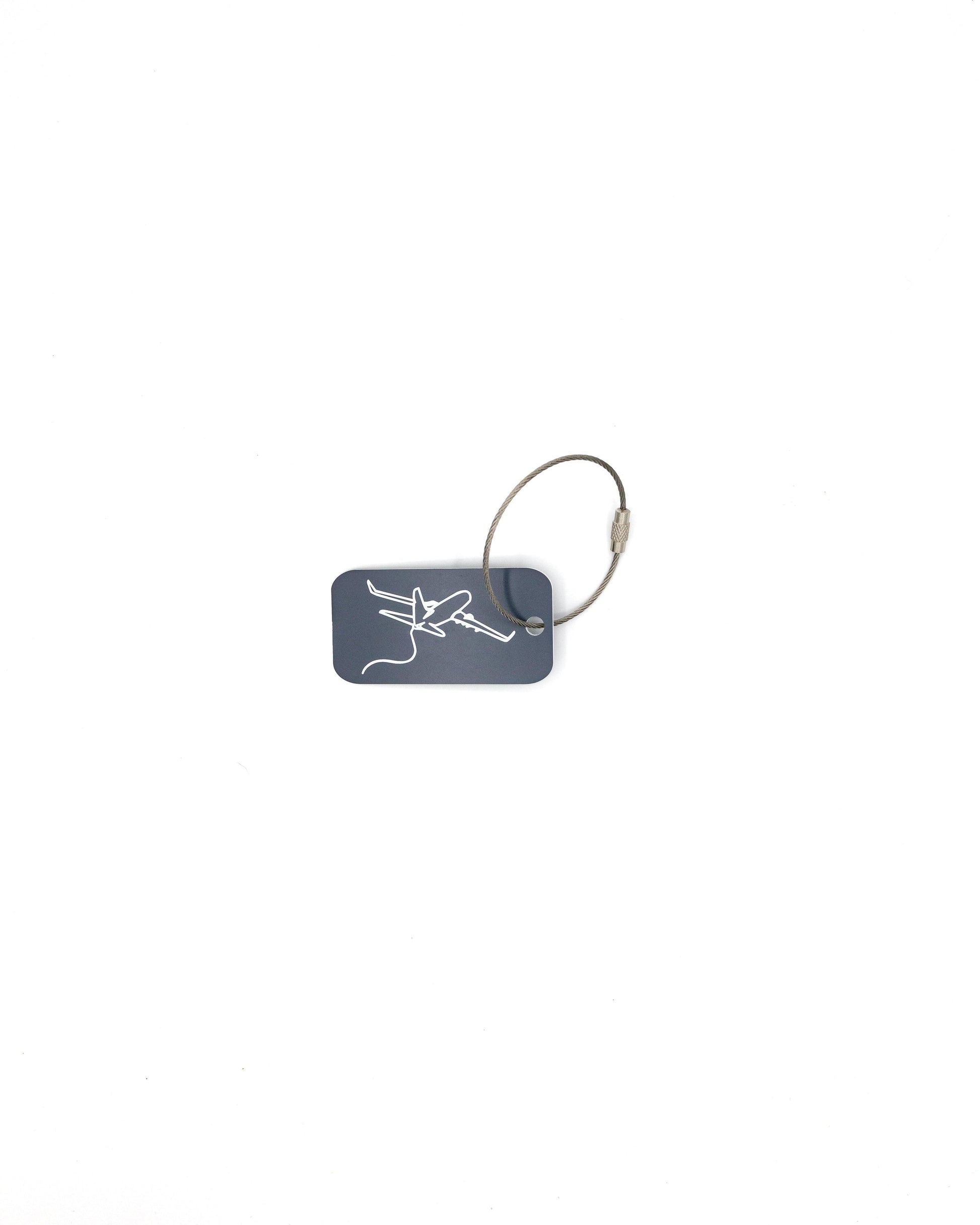 key tag with airplane design travel accessory grey with wire loop