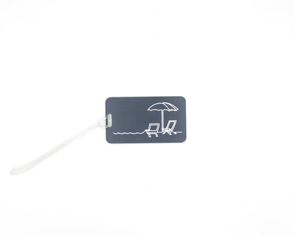 Beach Chair Design acrylic luggage tag in grey with worm loop.