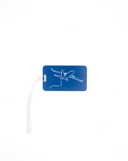 Plane Design acrylic luggage tag in light blue with worm loop.