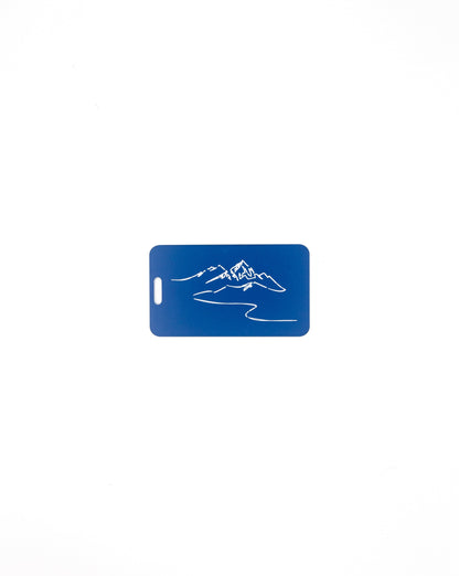 Mountain Design acrylic luggage tag in light blue.