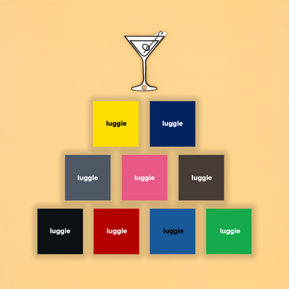 Martini glass keychain with color options in squares with beige background.