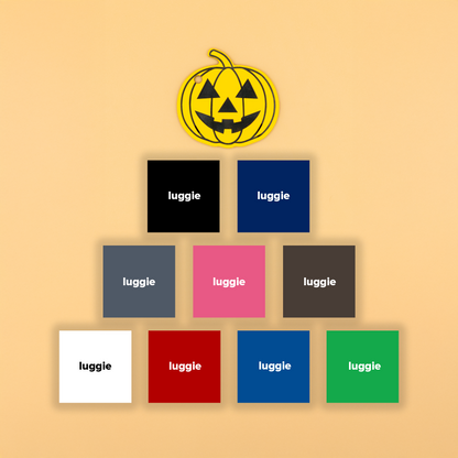 Yellow fall-themed pumpkin keychain with various color options on a beige background.