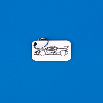 McLaren Senna Acrylic Keychain in white with classic key ring. 