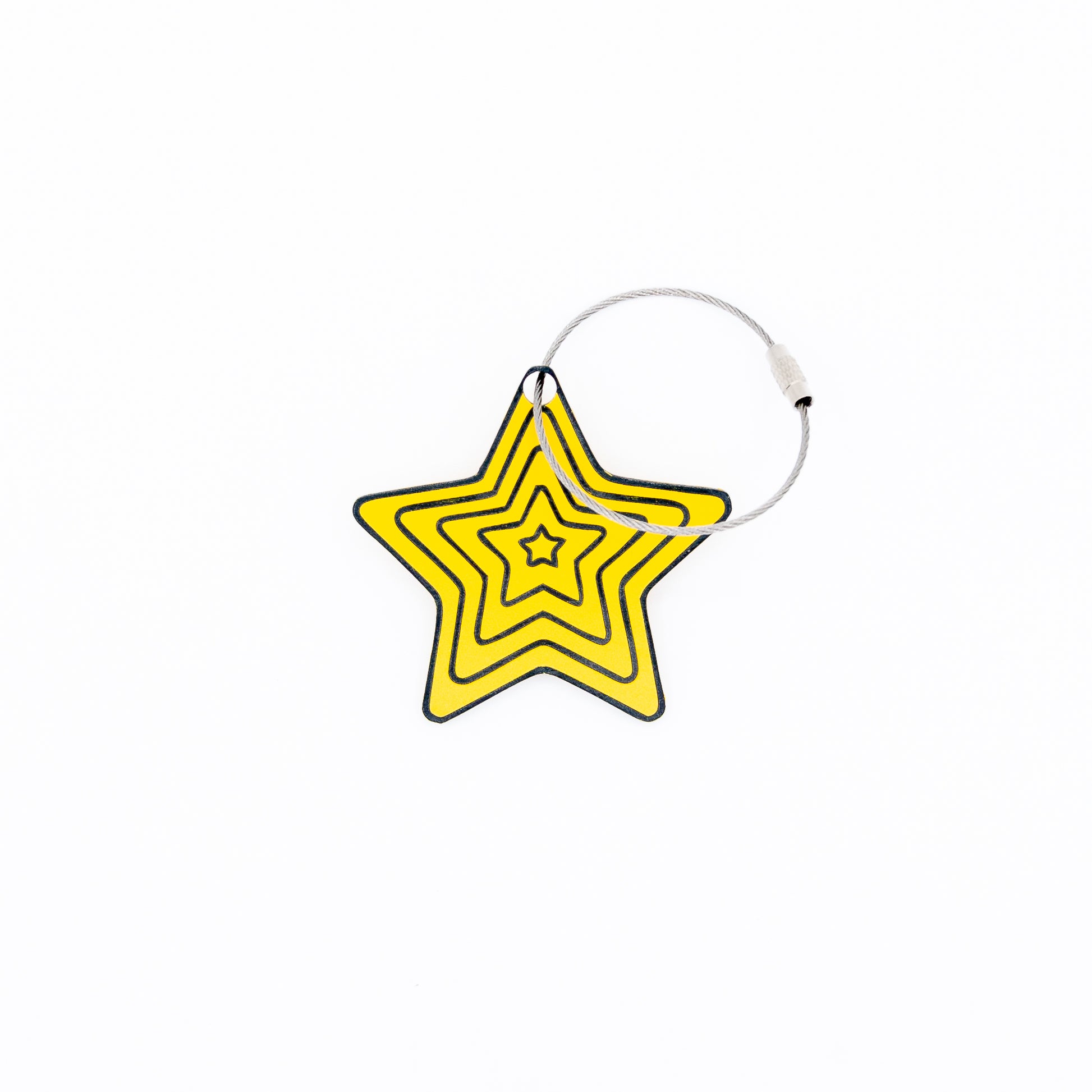Yellow star-shaped keychain with wire loop on a white background