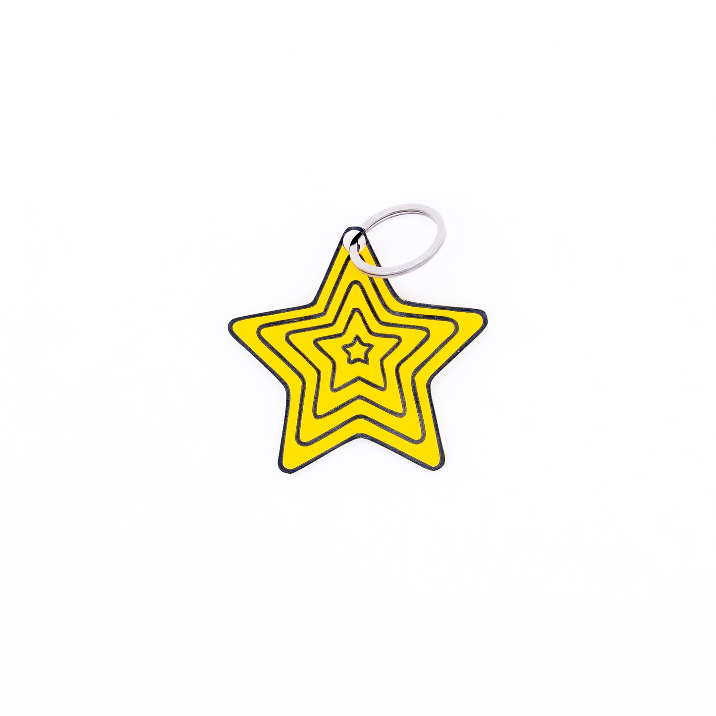 Yellow star-shaped keychain with key ring on a white background