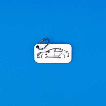 Subaru VA WRX Keychain with classic key ring on blue background