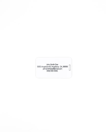 rear of globe design acrylic luggage tag with travel information in white