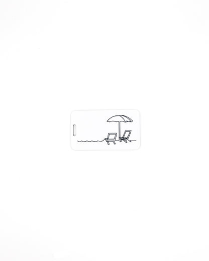 Beach Chair Design acrylic luggage tag in white with worm loop.