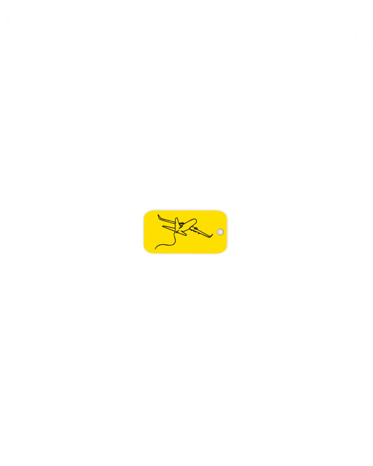 key tag with airplane design travel accessory yellow