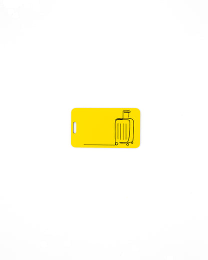 Mountain Design acrylic luggage tag in yellow.