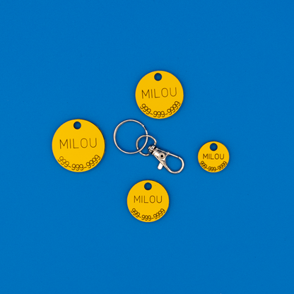 Circular Yellow Pet ID Tags in all sizes with strap option.