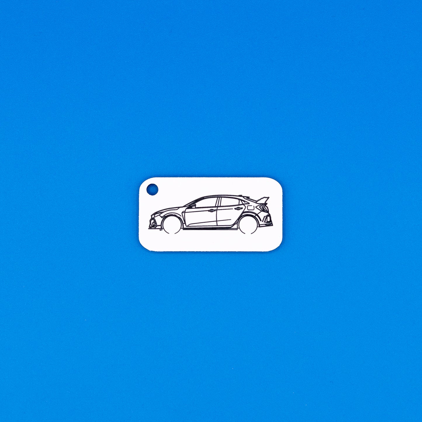 Honda Civic Type R keychain on blue background