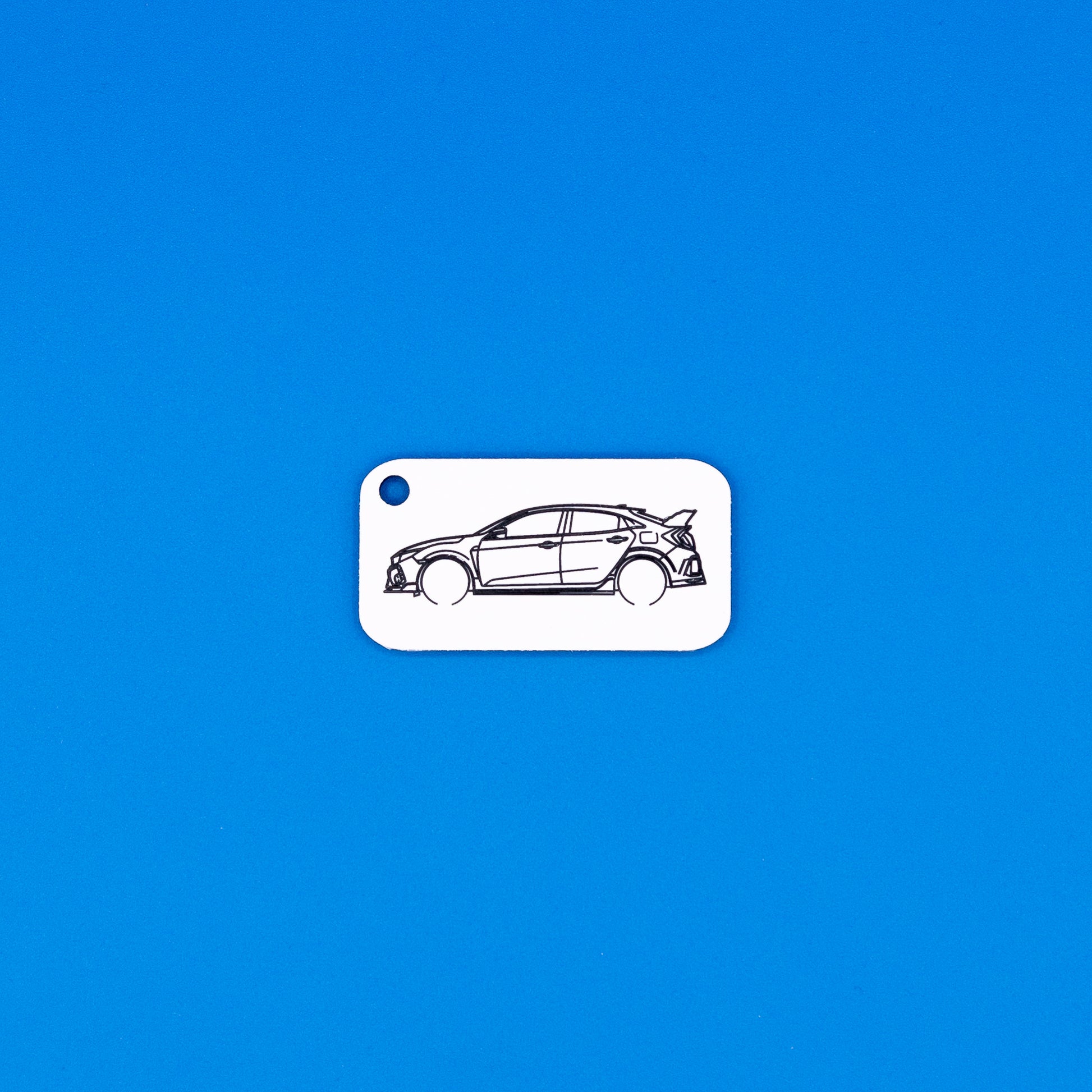 Honda Civic Type R keychain on blue background