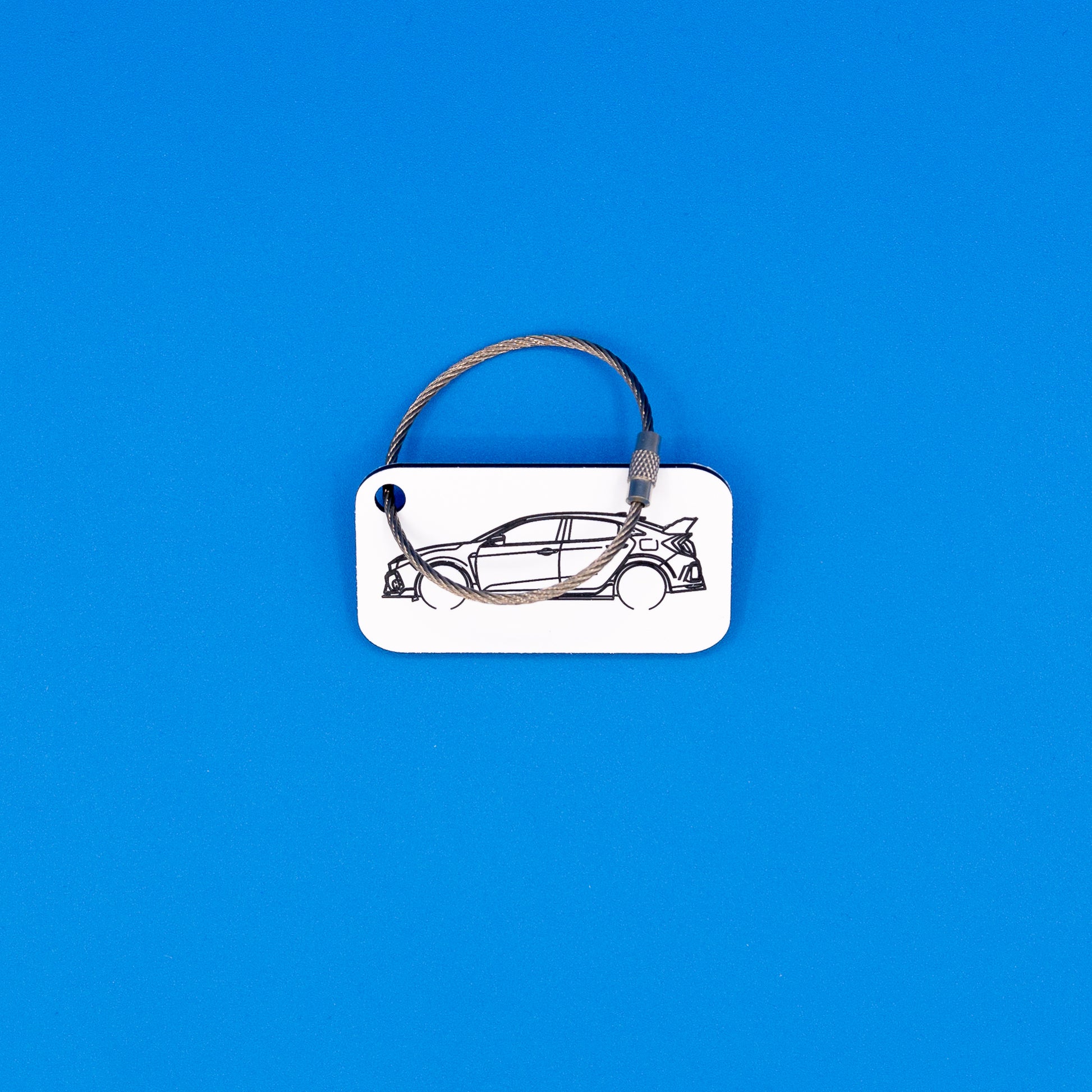 Honda Civic Type R keychain with wire loop on blue background