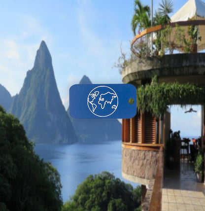 Global Keychain in light blue with chinese view in background. 