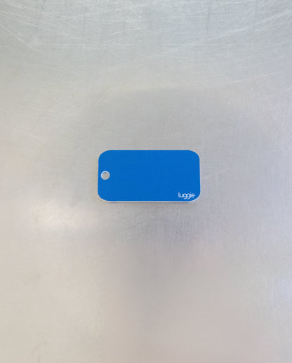 rear of light blue custom key tag 