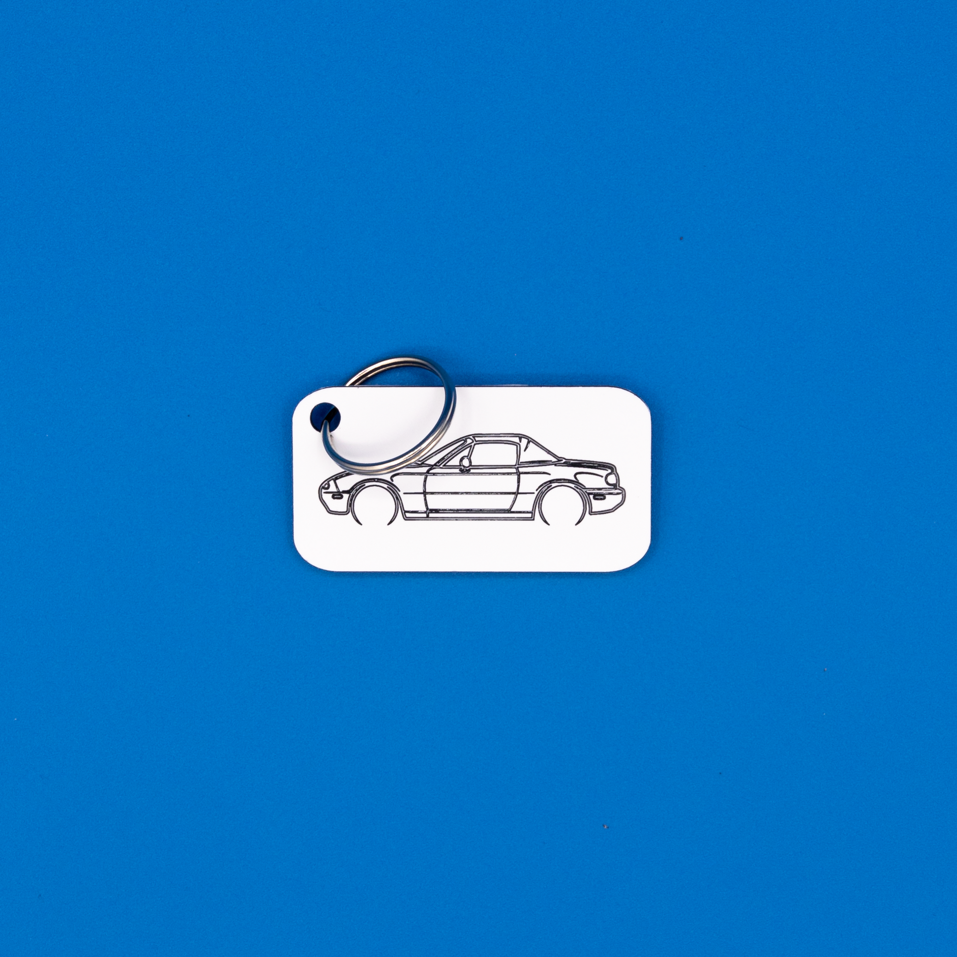 Mazda NA Miata Acrylic Keychain in white with classic key ring. 