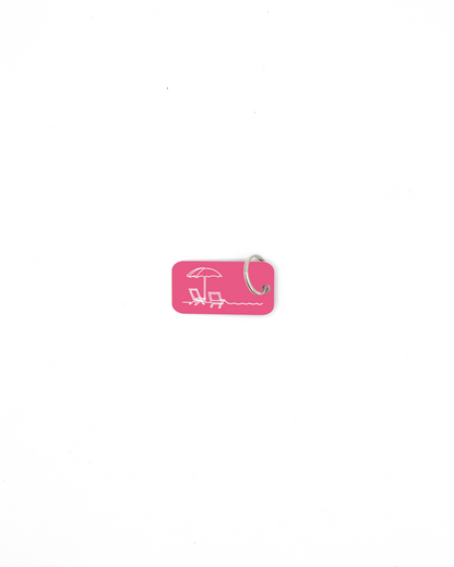 Beach design acrylic keychain with classic key ring in pink.