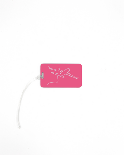Plane design acrylic luggage tag with worm loop in pink.